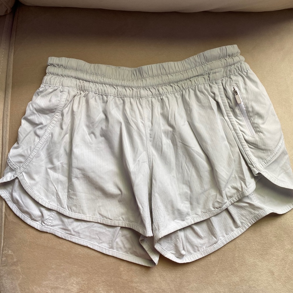 white Lululemon Tracker shorts, 4 inch size 12!